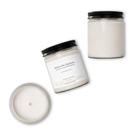 Before the Applause coconut cream and cardamom soy candle in its clear 9 oz jar