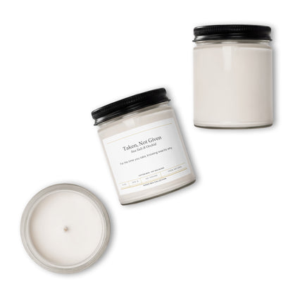 Taken, Not Given sea salt and orchid soy candle in its clear 9 oz jar