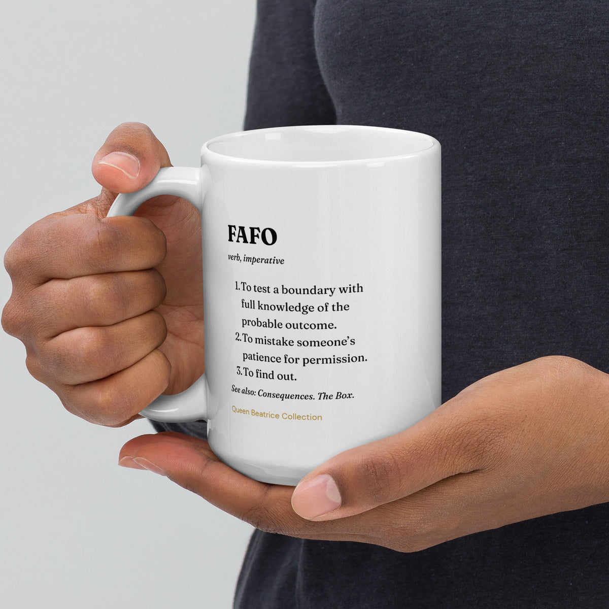 FAFO 15 oz white ceramic mug shown with the handle on the left