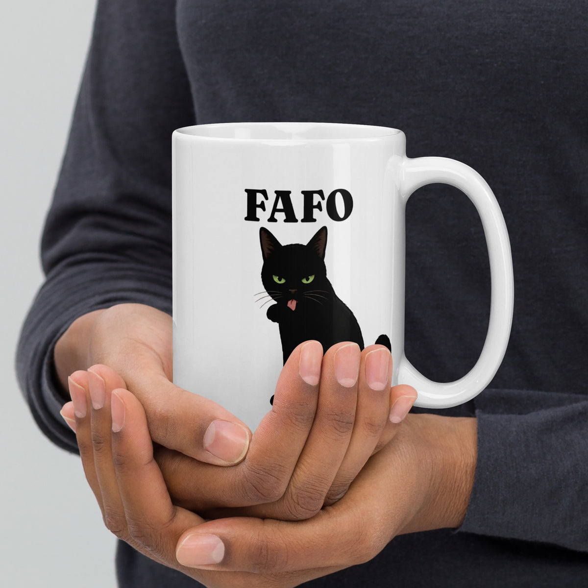 FAFO 15 oz white ceramic mug shown with the handle on the right